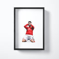 Bruno Fernandes celebration art print shown in a black frame