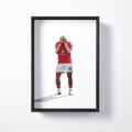 Bryan Mbeumo celebration art print shown in a black frame
